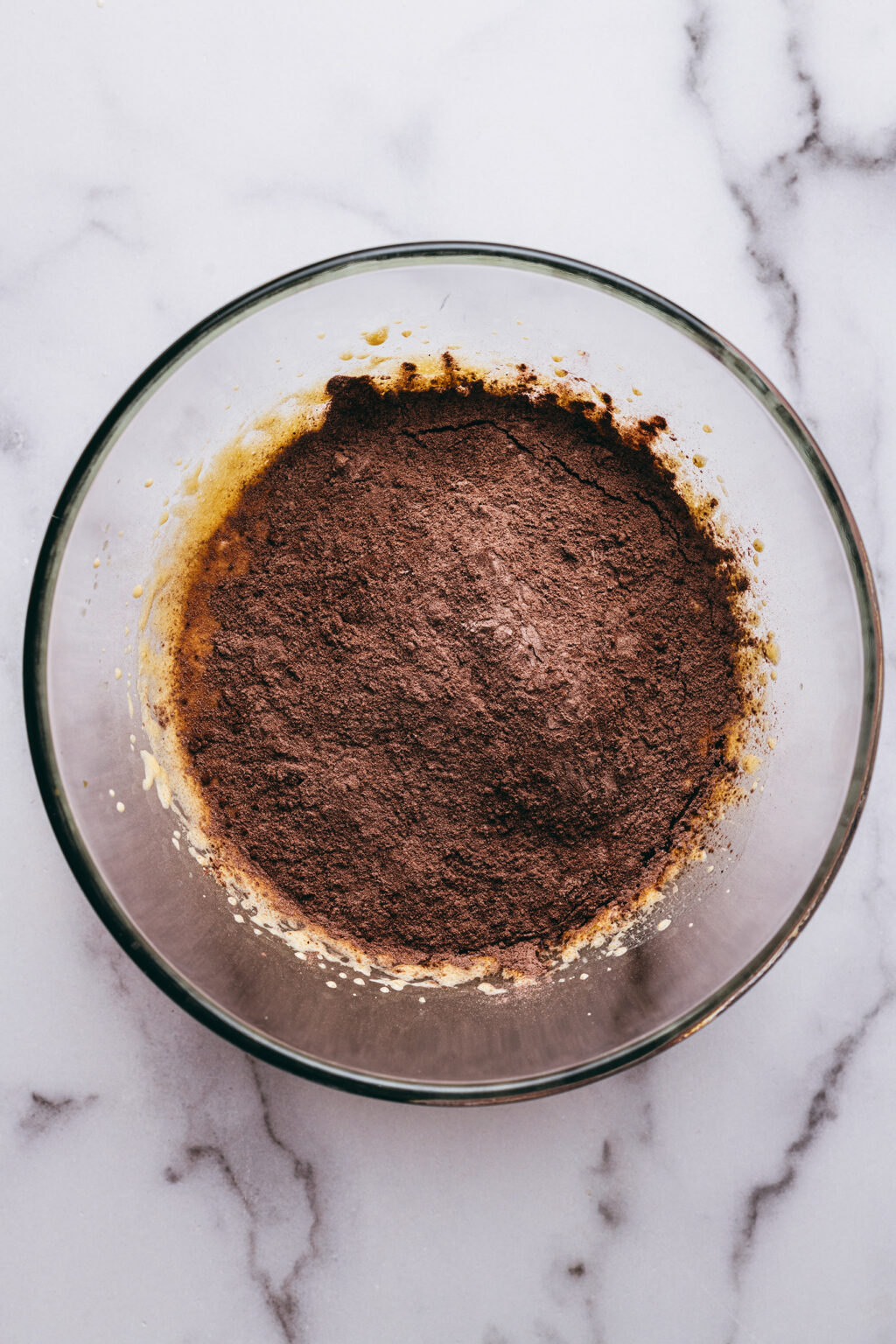 Adding cocoa to the cake - Lilie Bakery